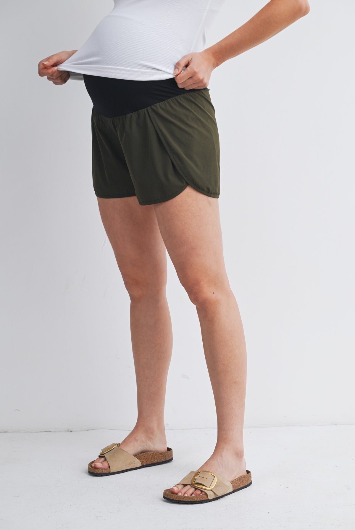 Olive Active High Waisted Maternity Shorts with Built-In Pocket Liner Side View
