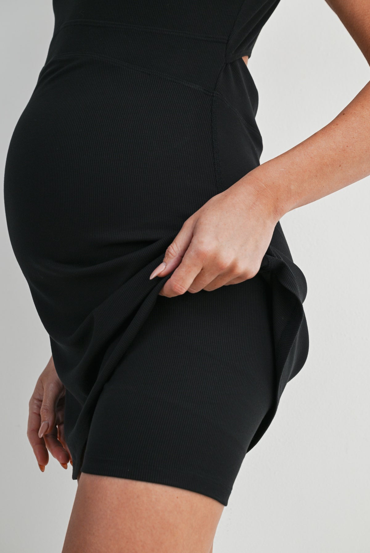 Black Ribbed Maternity Tennis Tank Dress with Built-In Shorts Close Up Detail