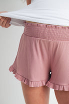 Mauve Smocked Waist Ruffled Hem Ribbed Maternity Shorts Detail Close Up