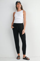 Black Relaxed Fit Maternity Lounge Wear Jogger Pants with Pockets Full Body View