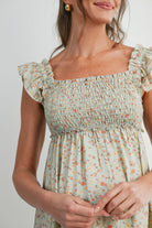 Green Floral Smocked Empire Waist Ruffle Cap Sleeves Maternity Dress Close Up