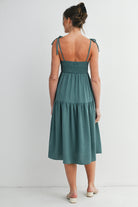 Green Smocked Empire Waist Maternity Midi Dress with Tie Straps & Pockets Back View