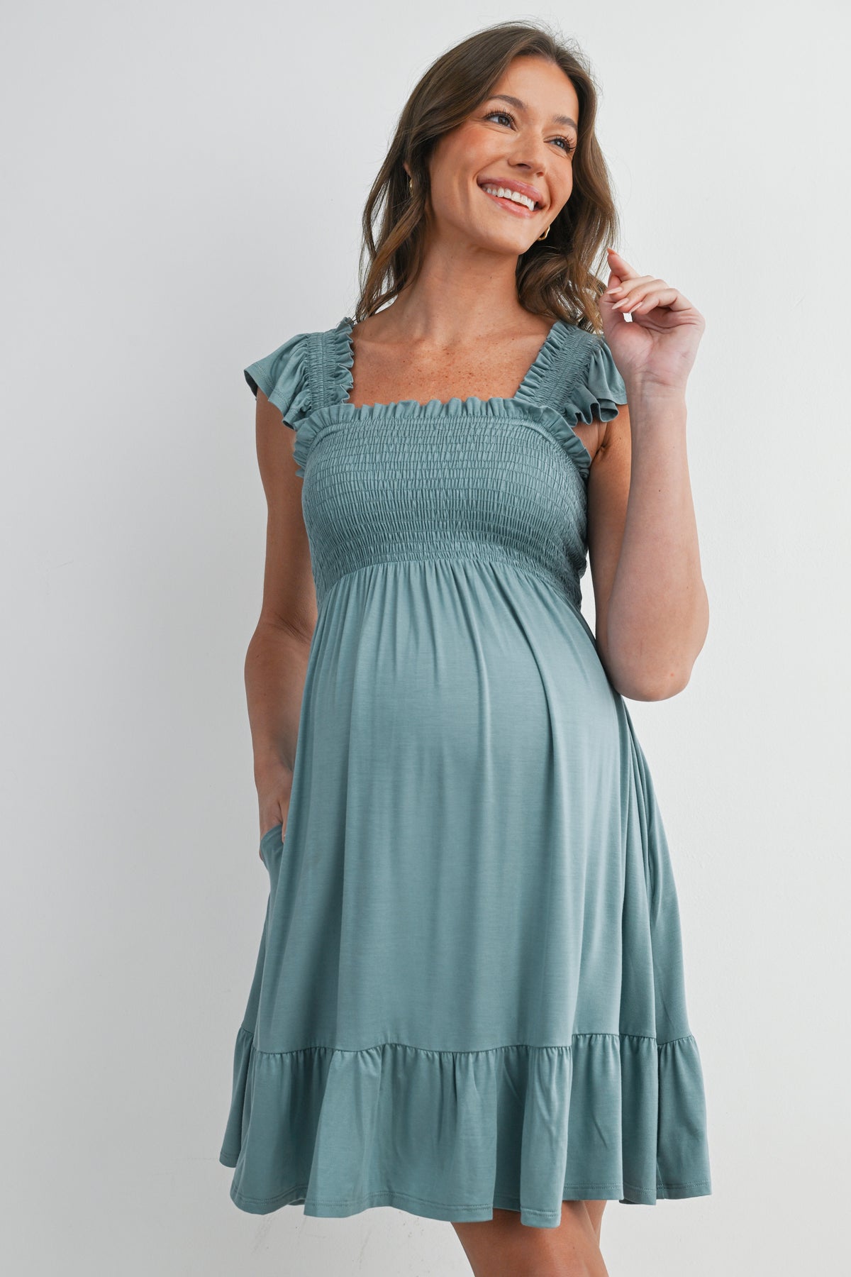 Sage Smocked Empire Waist Maternity Dress with Ruffle Hem Front View