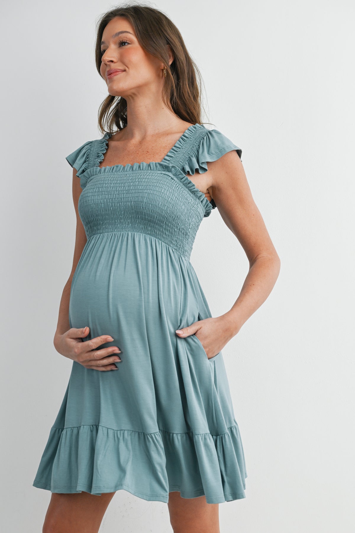 Sage Smocked Empire Waist Maternity Dress with Ruffle Hem Side View