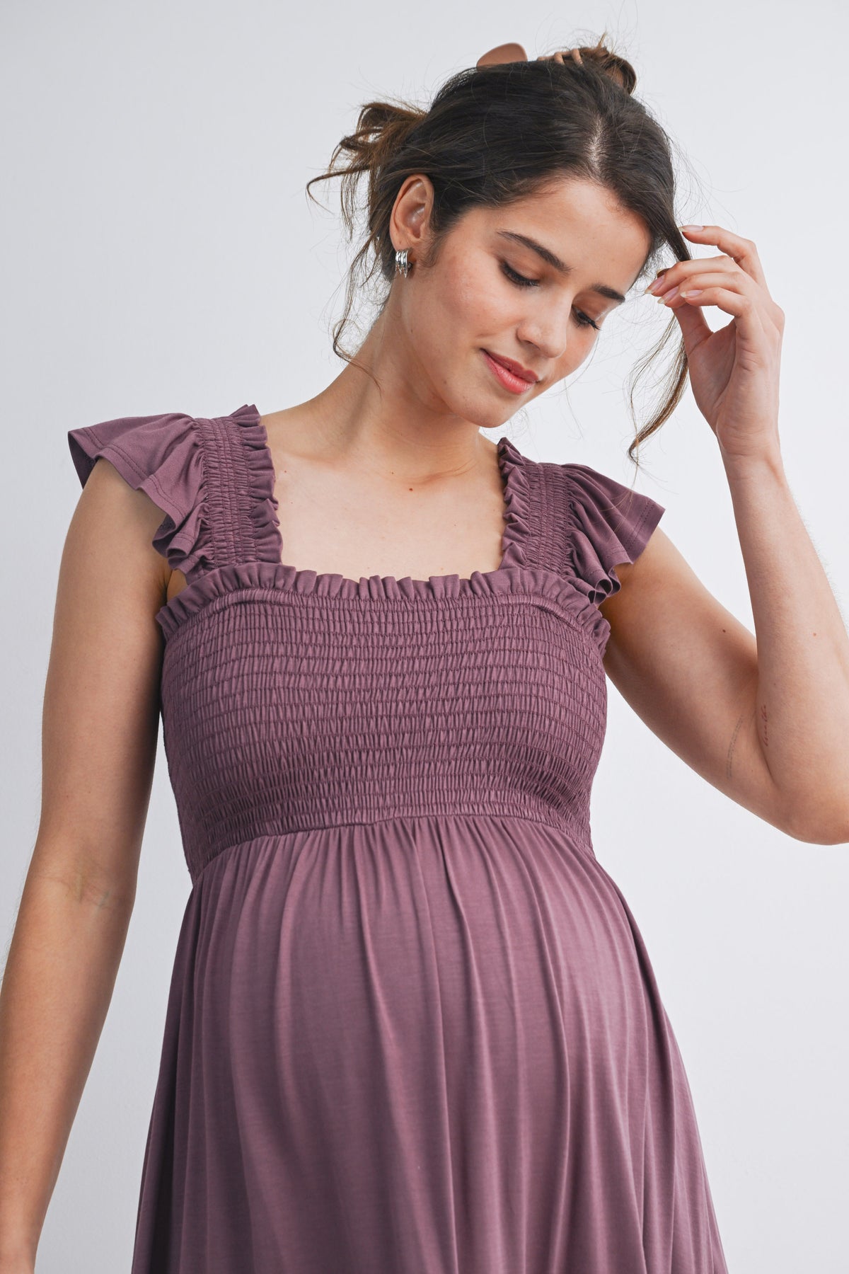 Mauve Smocked Empire Waist Maternity Dress with Ruffle Hem Close Up