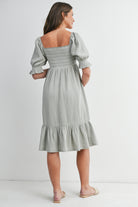 Sage Smocked Square Neck Puff Sleeve Ruffle Hem Maternity Midi Dress Back View