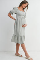 Sage Smocked Square Neck Puff Sleeve Ruffle Hem Maternity Midi Dress Side View