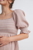 Mauve Smocked Square Neck Puff Sleeve Ruffle Hem Maternity Midi Dress Close Up