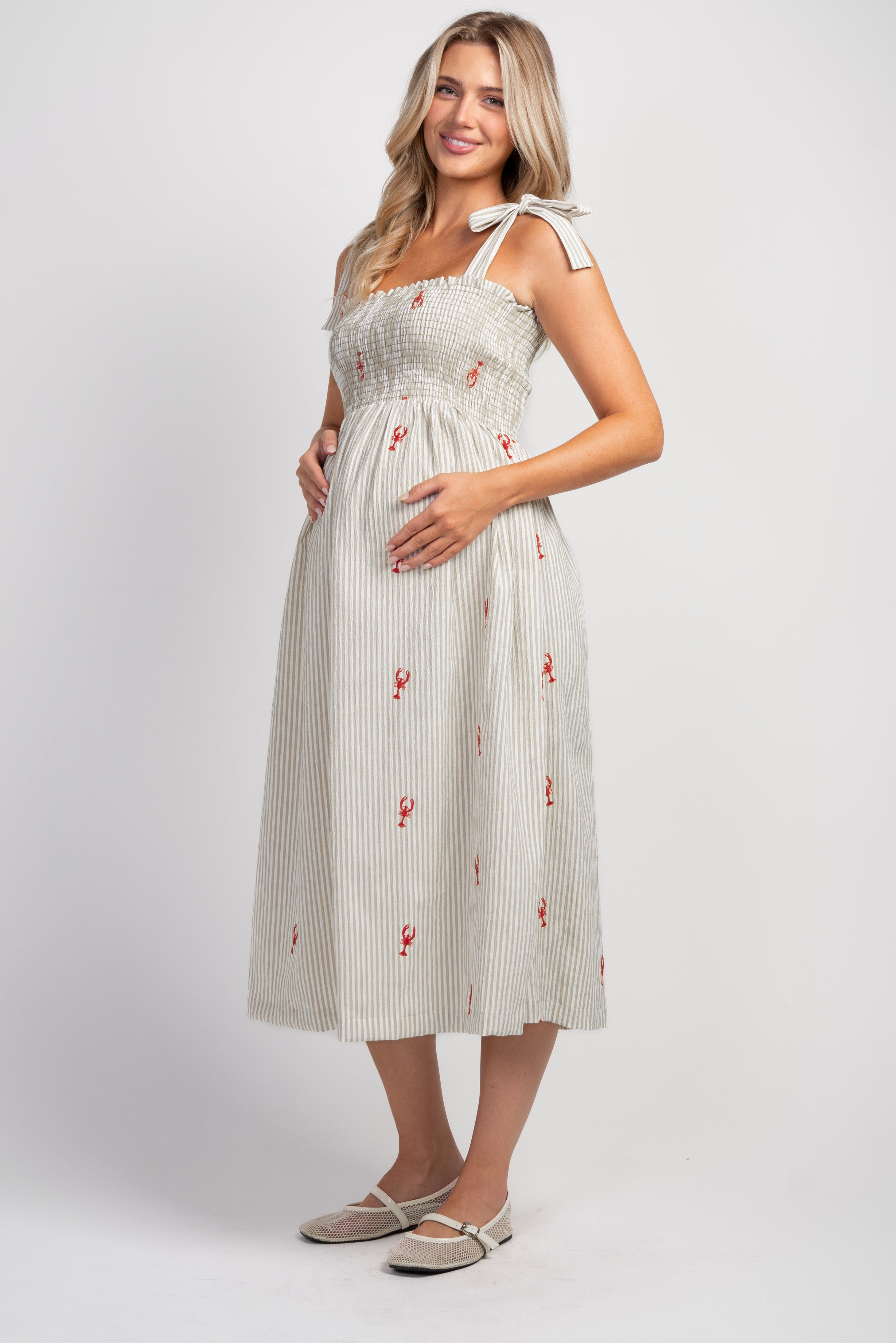 Taupe Striped smocked tie shoulder maternity midi dress with red lobster embroidery – side view