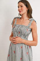 Black Striped maternity midi dress with stretchy smocked bodice – close-up detail