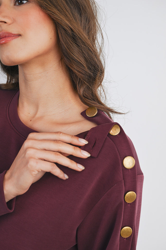 Dark Wine Long Sleeve Crewneck Ruffle Hem Maternity Dress Button Detail Close Up