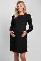 Ribbed long sleeve maternity nursing dress with snap front in black – front view