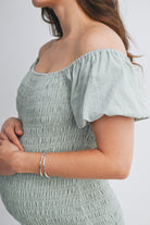 Sage Off Shoulder Smocked Ruffle Hem Maternity Midi Bodycon Dress Close Up