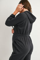 Back detail of charcoal maternity hooded jumpsuit with elasticized waist