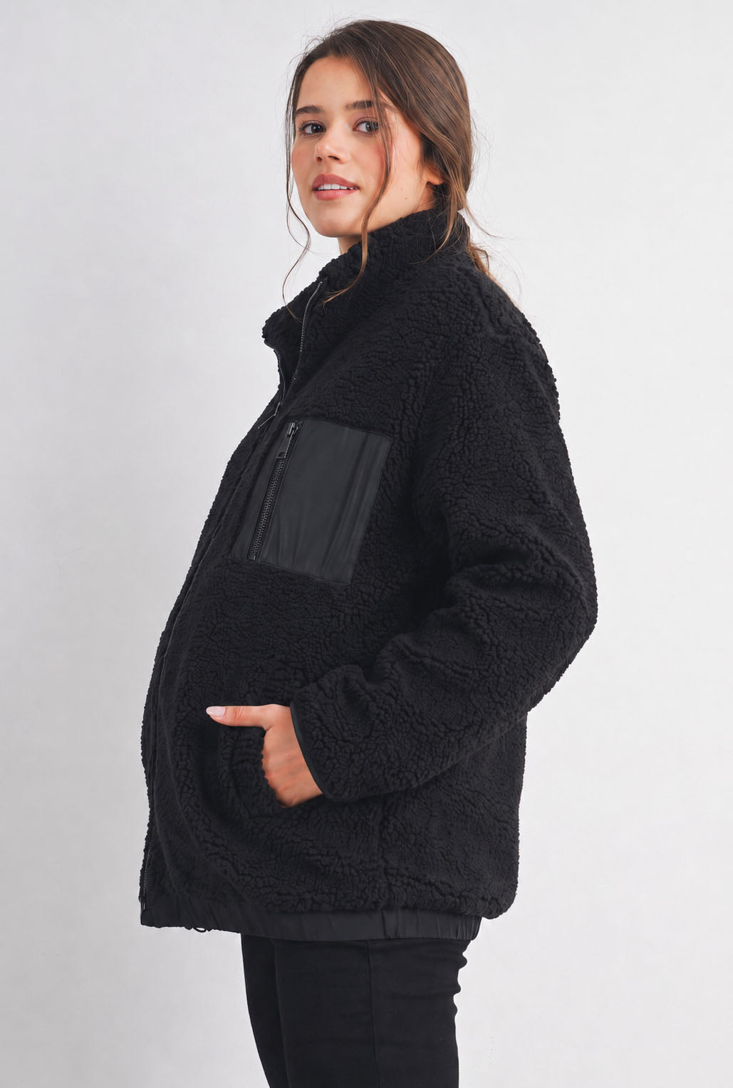 Side view of Hello Miz Black Teddy Zip Up Maternity Fleece Jacket