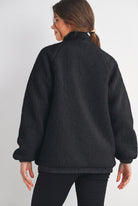 Back view of Hello Miz Black Teddy Zip Up Maternity Fleece Jacket