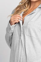 Close up of heather grey maternity nightshirt collar piping, buttons and chest pocket