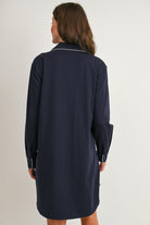Back view of navy maternity nursing sleep shirt nightgown with shirttail hem