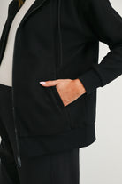 Black maternity zip-up hoodie with front pockets and long sleeves
