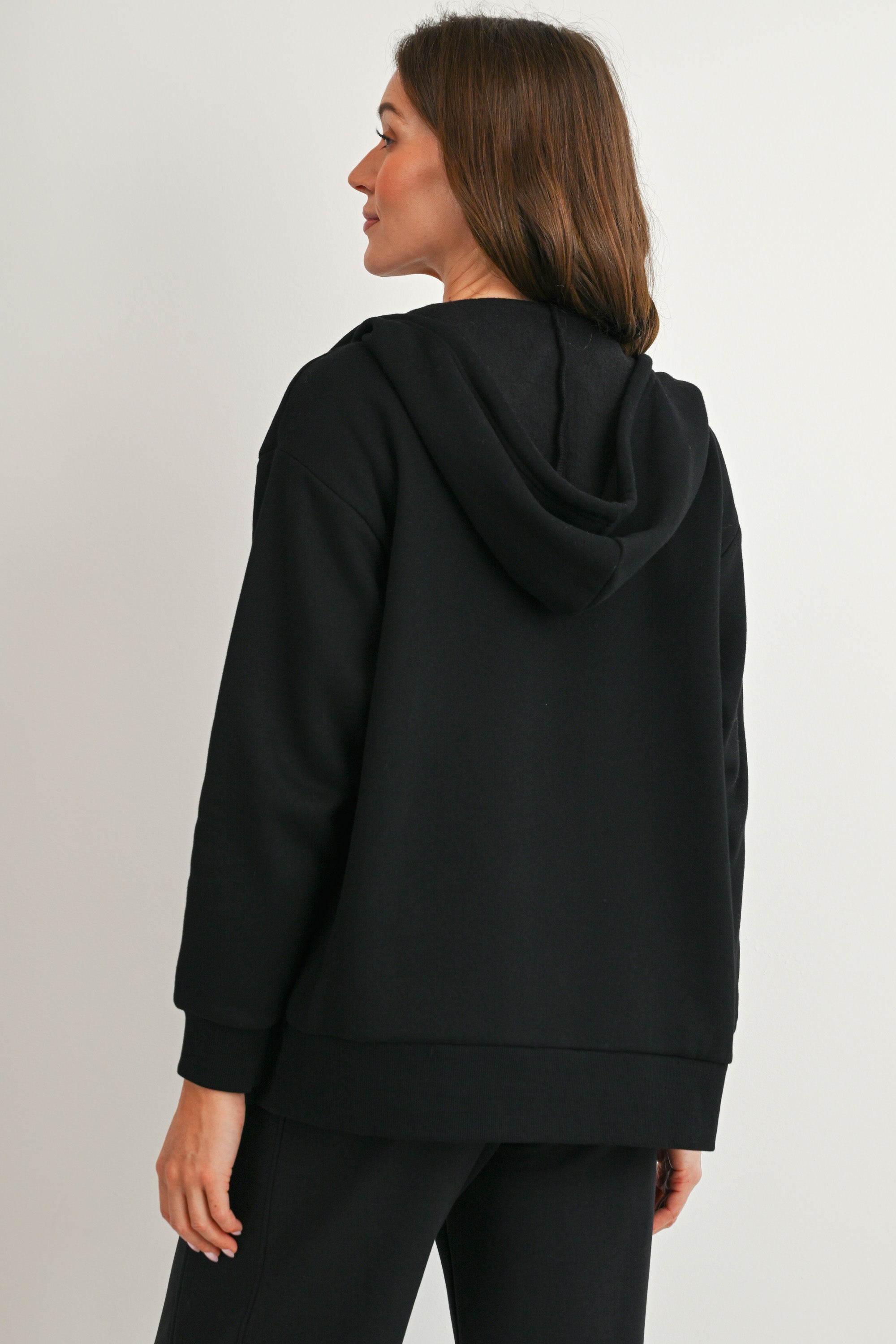 Back view of black maternity hoodie with hood