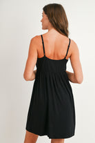 Back view of black maternity nursing dress with adjustable shoulder straps